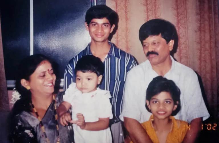 Purva Kaushik childhood image with her family